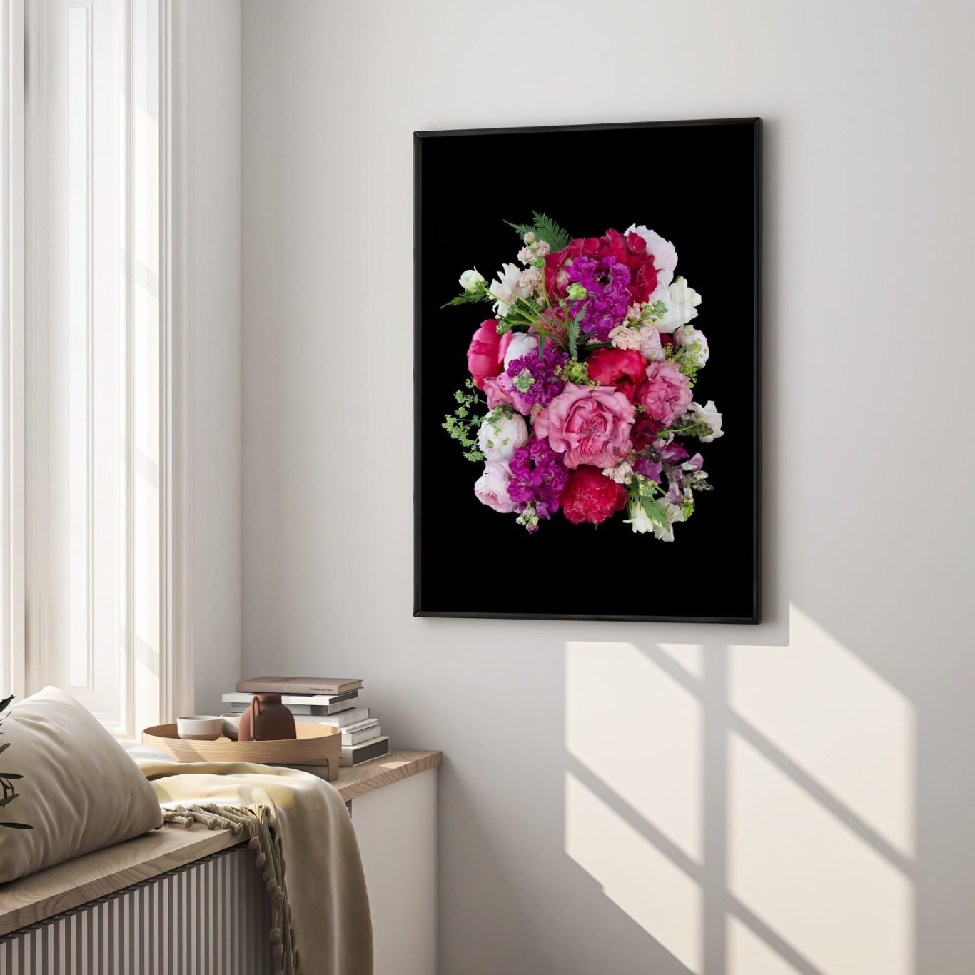 Art & Eden floral artwork: bold bouquet of deep red, white, and blush blooms on black background, displayed as elegant wall art in a room.